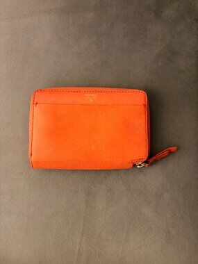 Fossil Orange leather wallet, zip closure, 7 credit card slips, change pocket